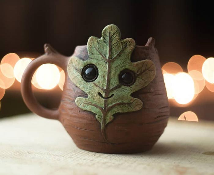 Alex Mrachkovskiy's inspired work Clay Face Mug