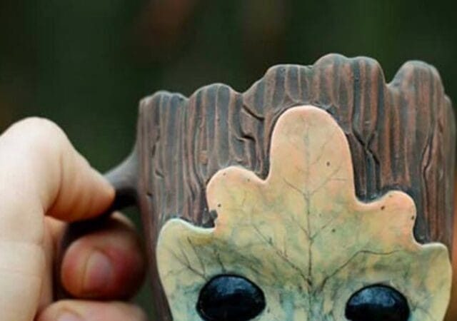 Alex Mrachkovskiy's inspired work Clay Face Mug