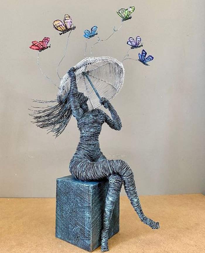 All a Flutter figurative wire sculpture by Annie Glass