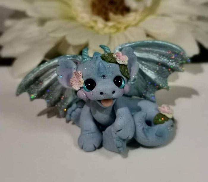 Polymer clay dragon with wings by Laura