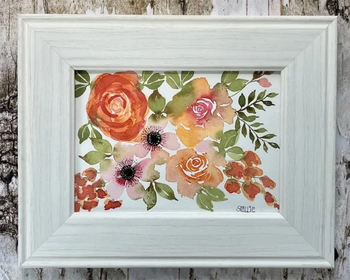 Pink and orange watercolor florals painting by Shellie Sylla