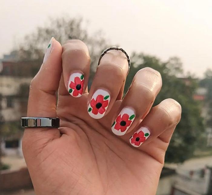Cute floral nail art by Swati Jha