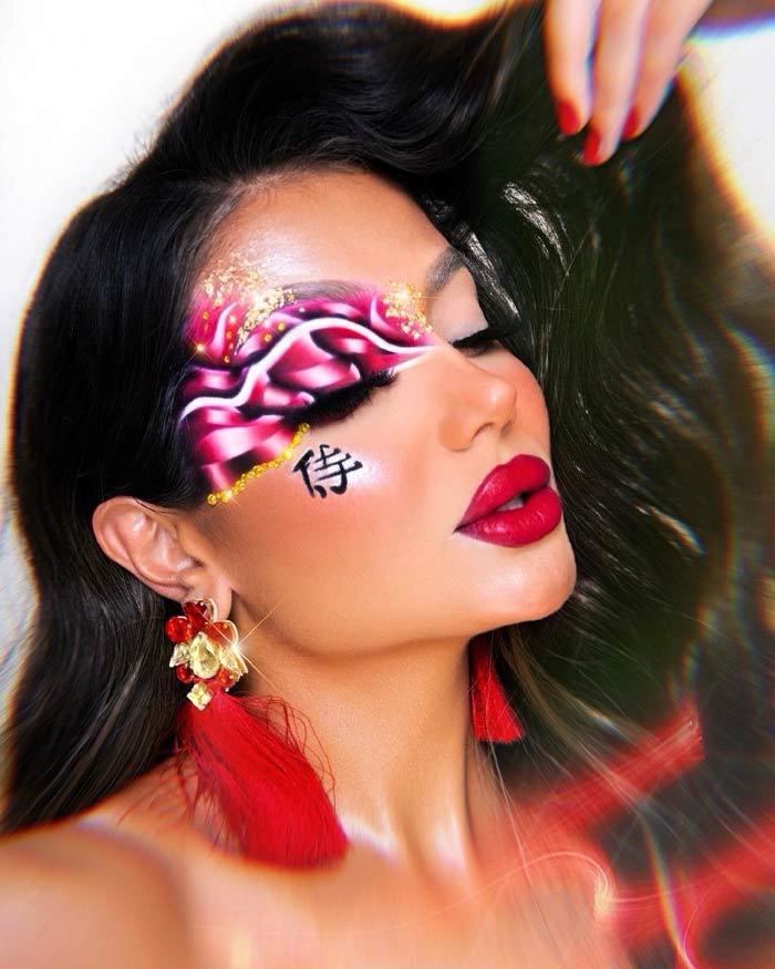 Stunning colorful makeup look by Iman Abdul