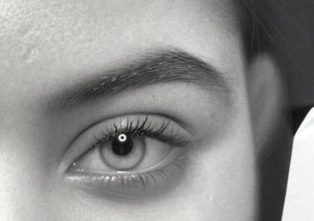 amazingly photorealistic portrait drawing by Artist Kenny Daniel