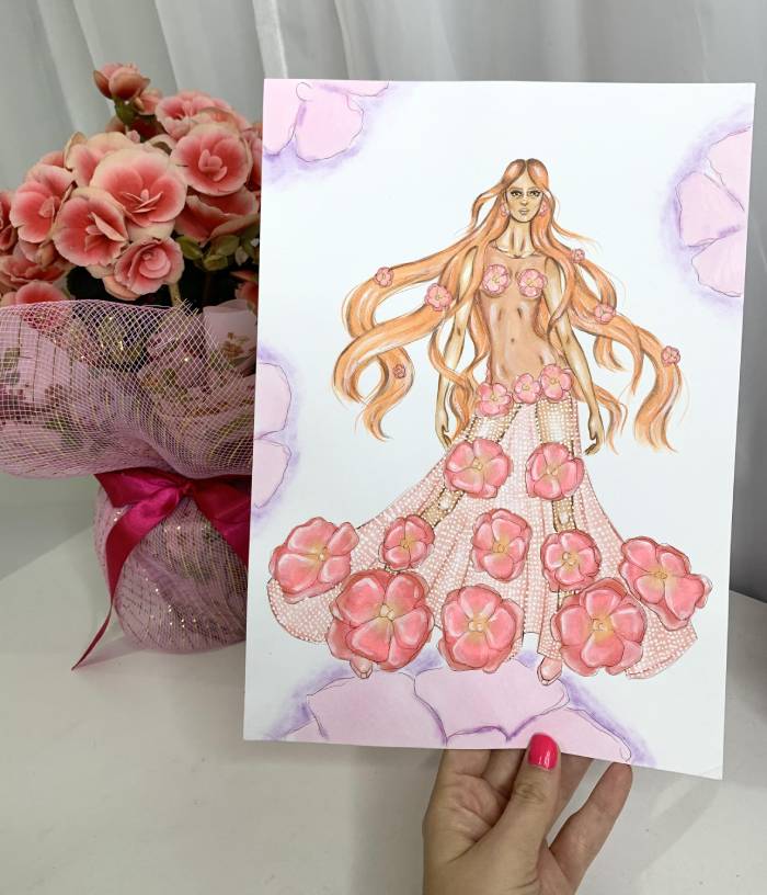 Fashion designer sketching clothing designs