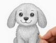 Final step in drawing a puppy with a realistic pencil sketch, showing a hand holding a pencil adding shading and texture to the fur.