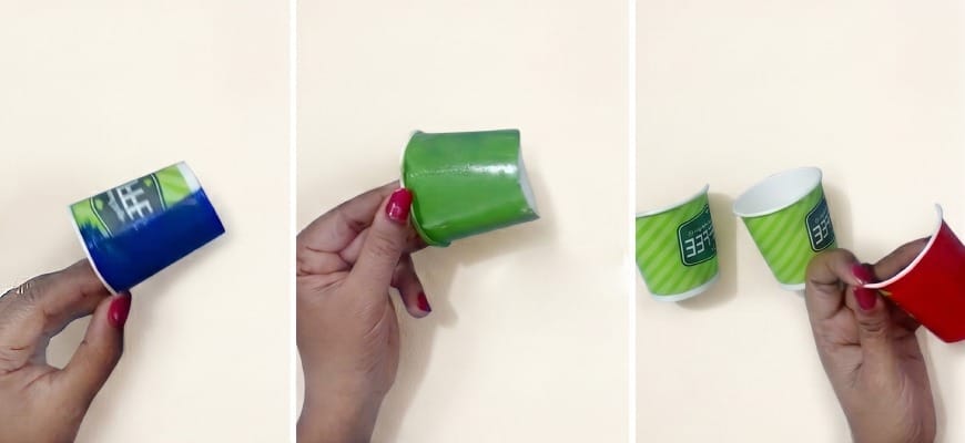 Small cups painted in red green and blue colors for diy cardboard wall decor craft
