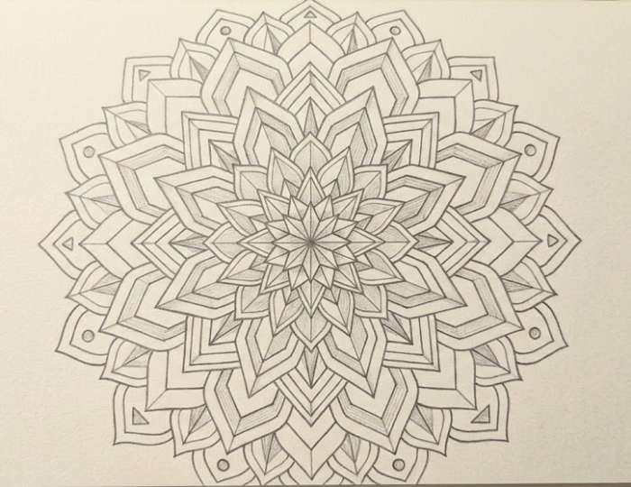 Geometric dahlia flower design featuring symmetrical shapes and layered petals