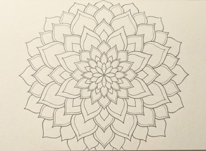 Mandala-inspired dahlia drawing with symmetrical layered petals and intricate floral details
